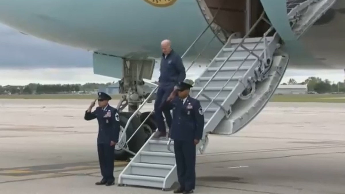 Biden slips on stairs