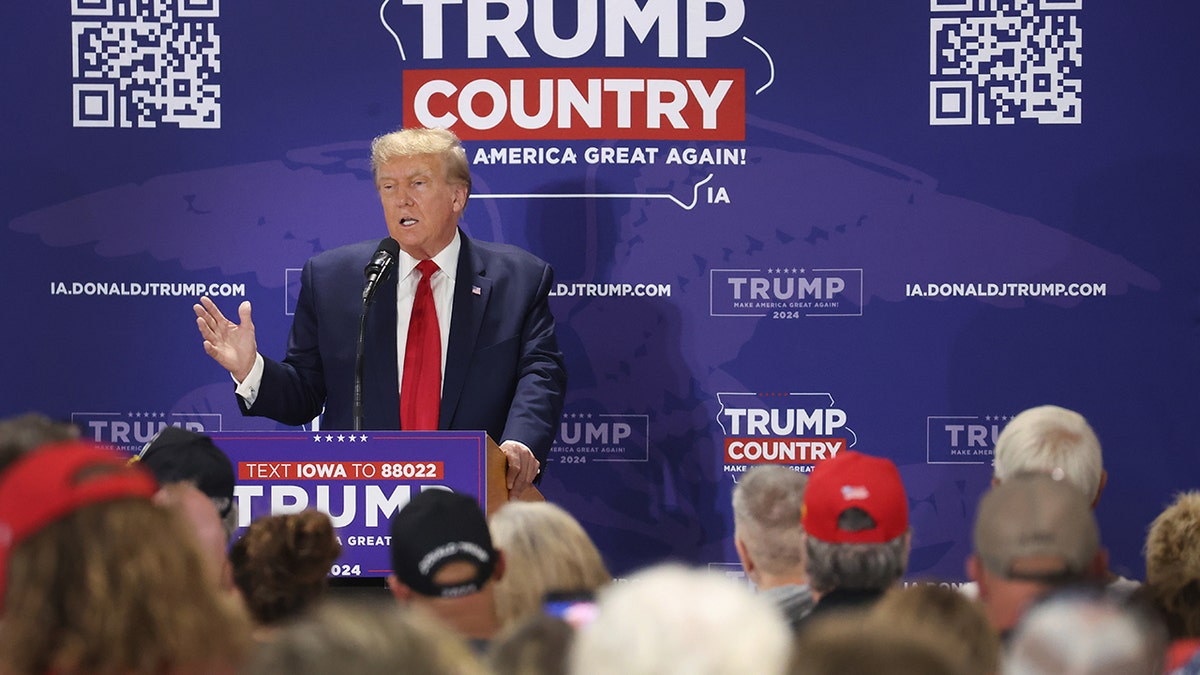 Former President Donald Trump speaks at "Commit to Caucus" rally