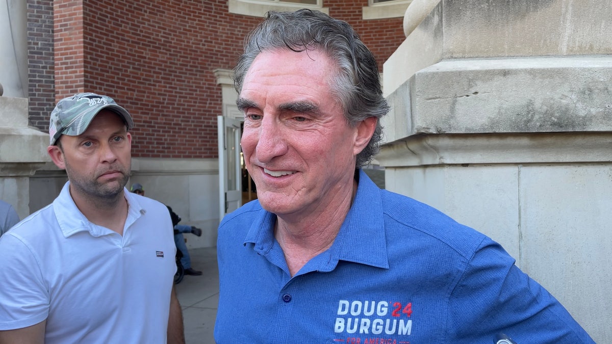 Doug Burgum is ‘excited’ to be on the debate stage ‘regardless of who shows up’