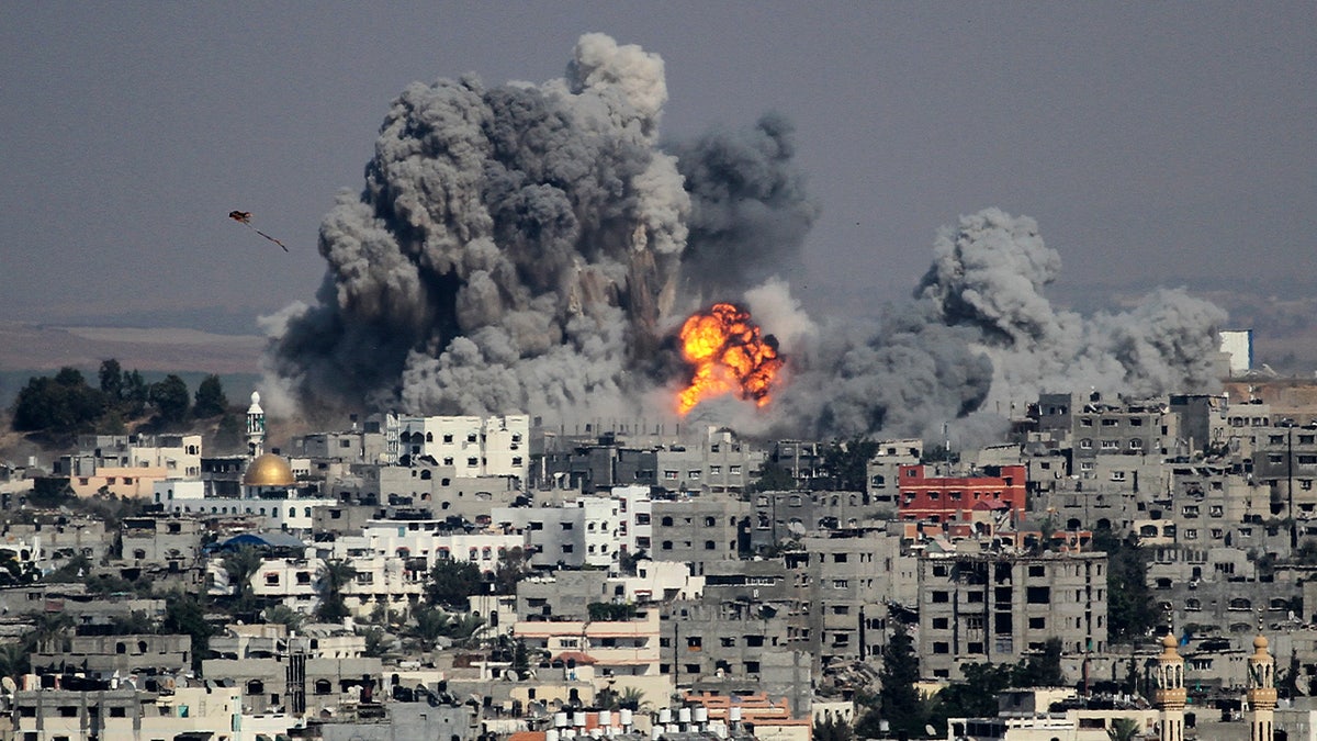 Smoke rises after an attack of Israeli aircraft in the east of Gaza City on July 29, 2014. The home of Hamas Gaza political leader Ismail Haniyeh was among the locations targeted by air, sea and land strikes overnight in the heaviest bombardment of Gaza since the start of the conflict in July, local health officials say at least 100 people have been killed in Gaza within just 24 hours. (Photo by Sameh Rahmi/NurPhoto) (Photo by NurPhoto/Corbis via Getty Images)