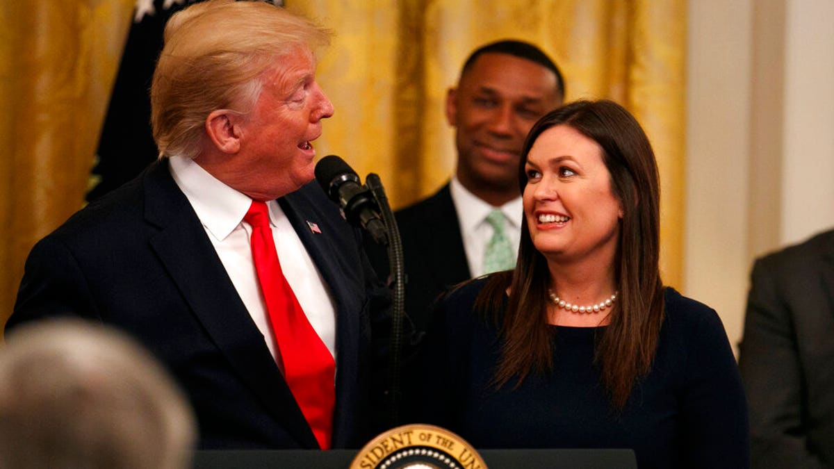 Trump looks to Sanders during press conference at White House