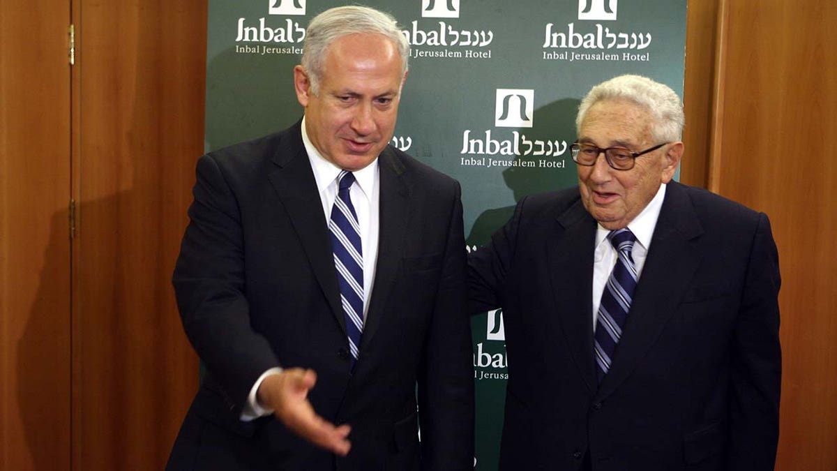 Former US Secretary of State Henry Kissinger with Benjamin Netanyahu