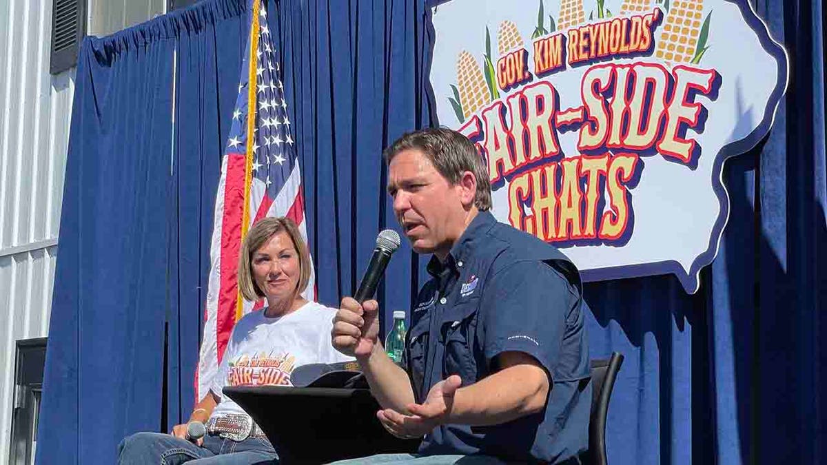 DeSantis and Reynolds at the Iowa State Fair in Des Moines, Iowa from August 12, 2023.