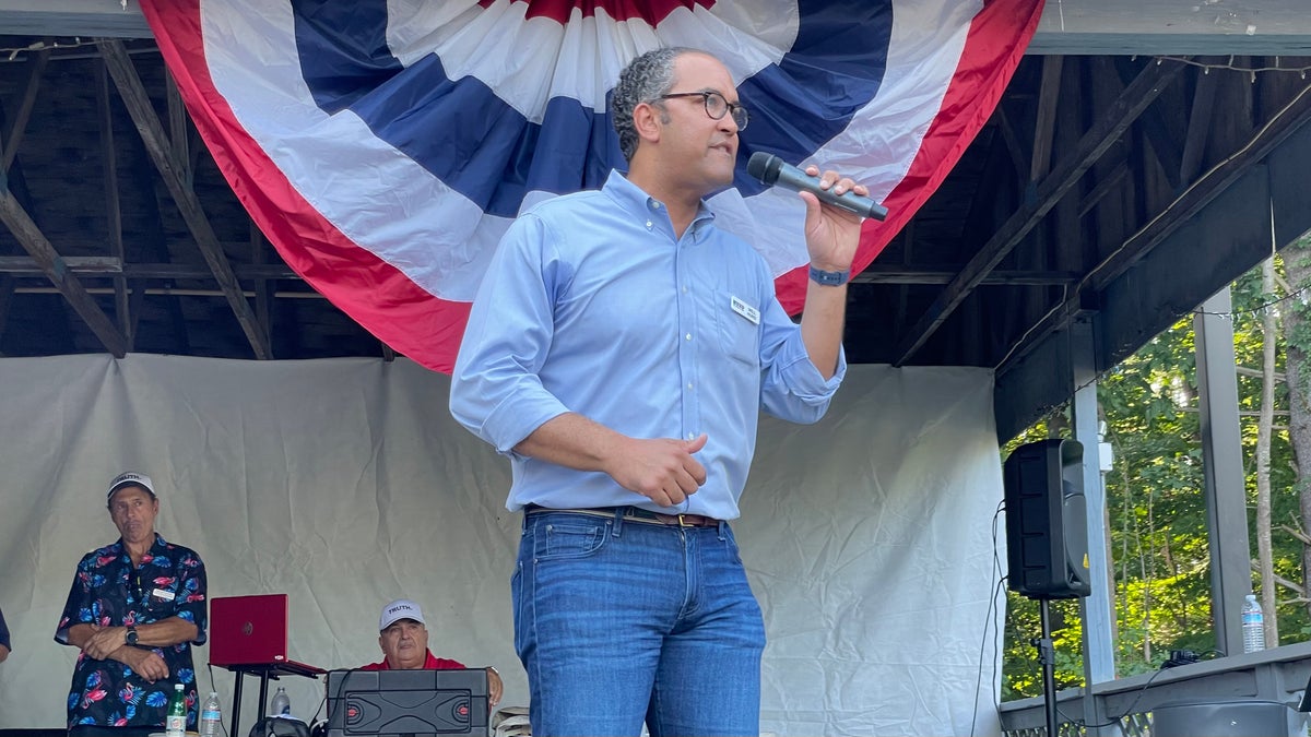 Former Rep. Will Hurd with microphone