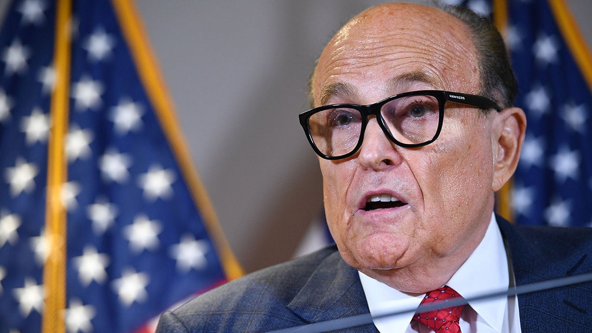 Trump's personal lawyer Rudy Giuliani speaks during a press conference at the Republican National Committee