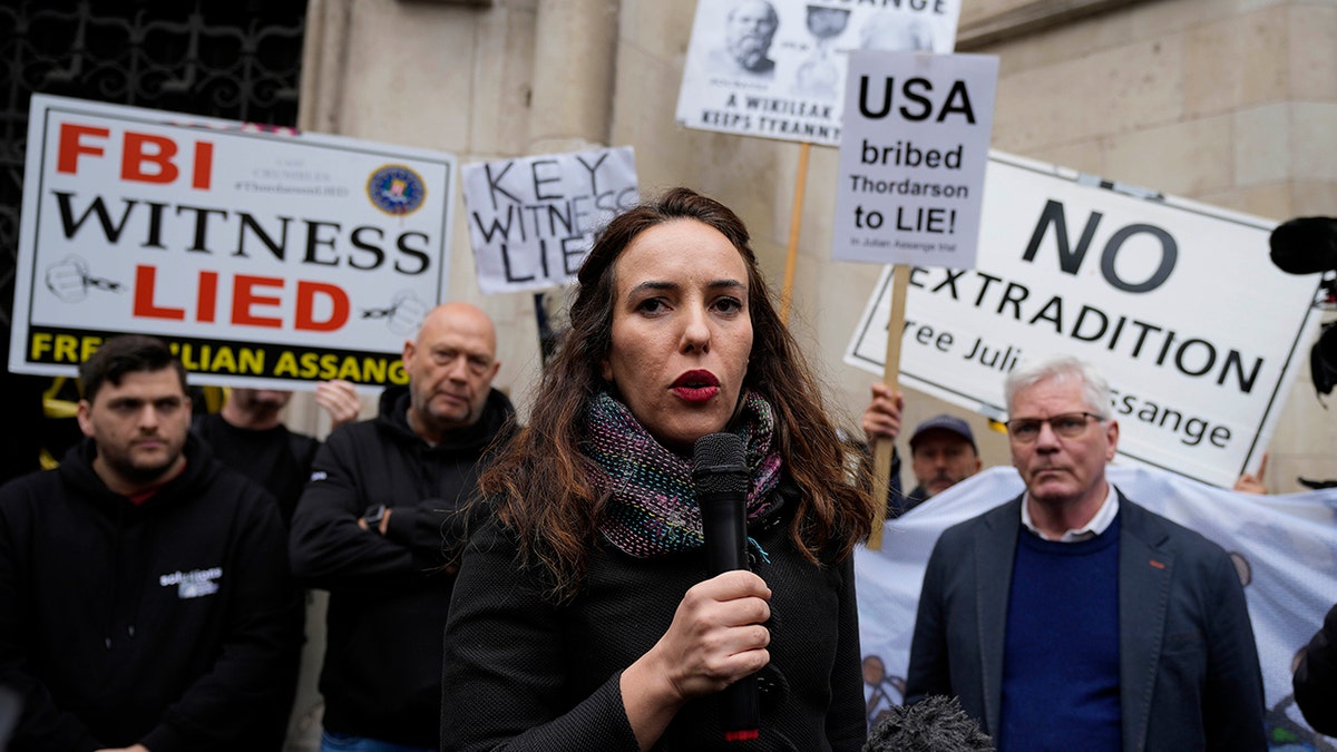 Stella Assange speaking at protest