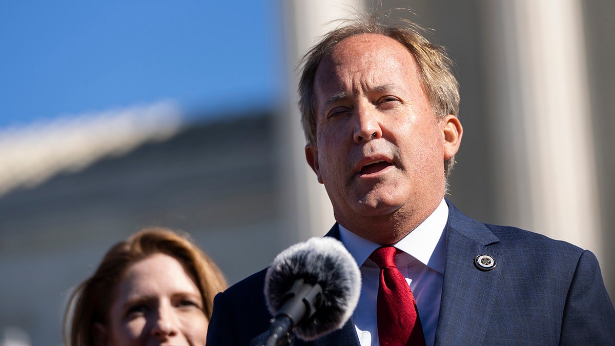 Texas Attorney General Ken Paxton in front of Supreme Court