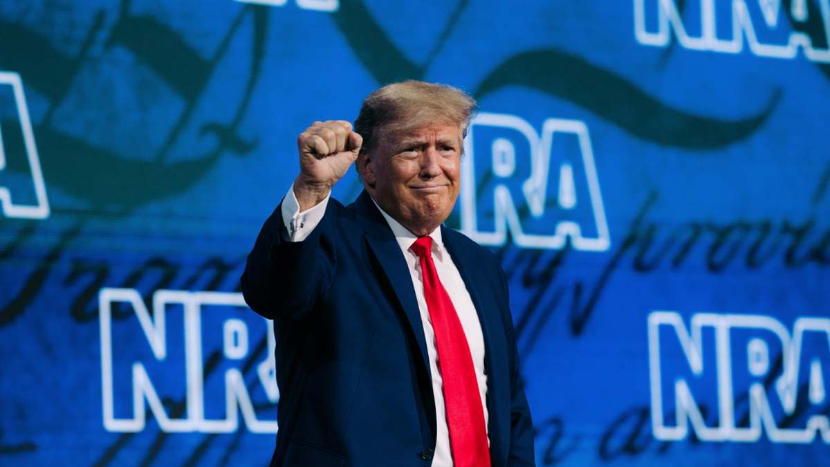 Trump at NRA event raising fist