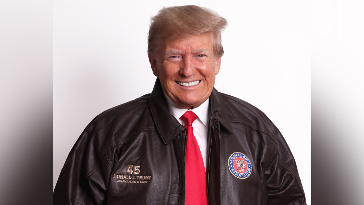 Donald Trump in NRA bomber jacket
