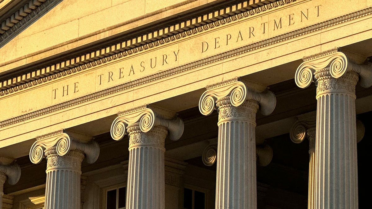 The Treasury Department is seen near sunset