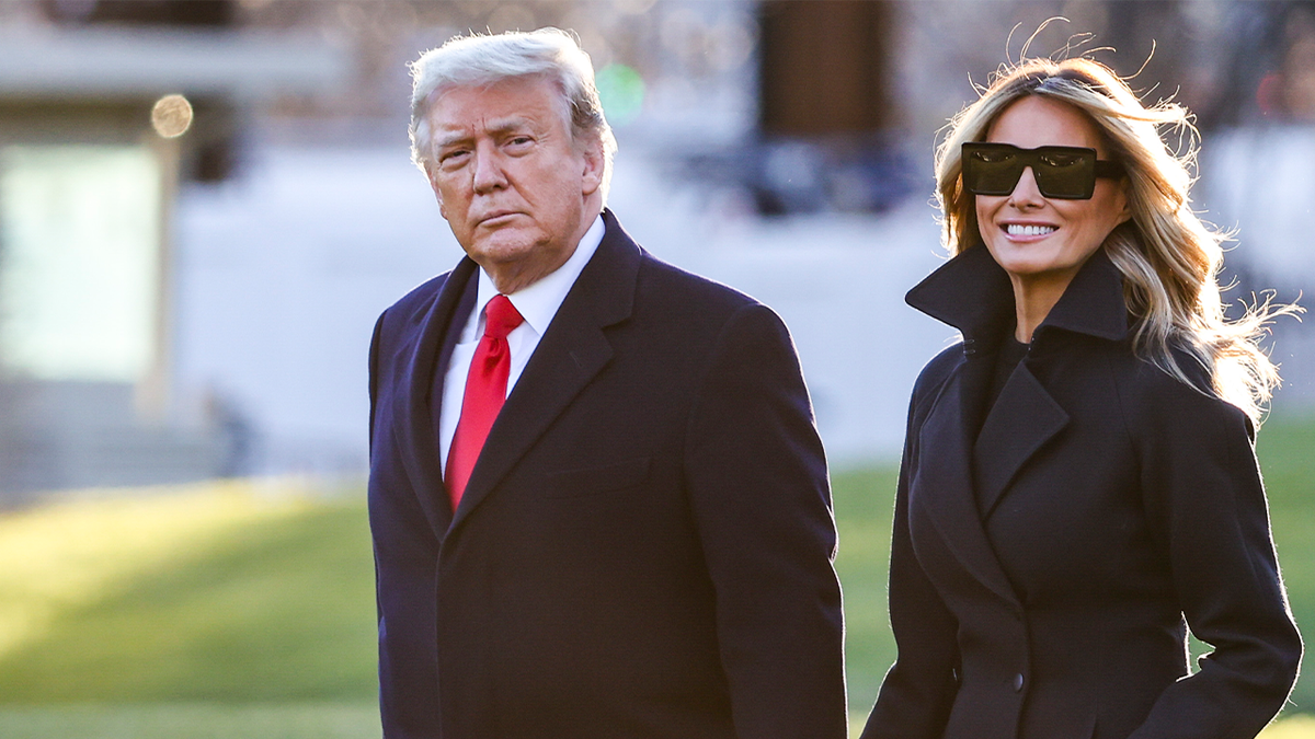 Donald and Melania Trump walking
