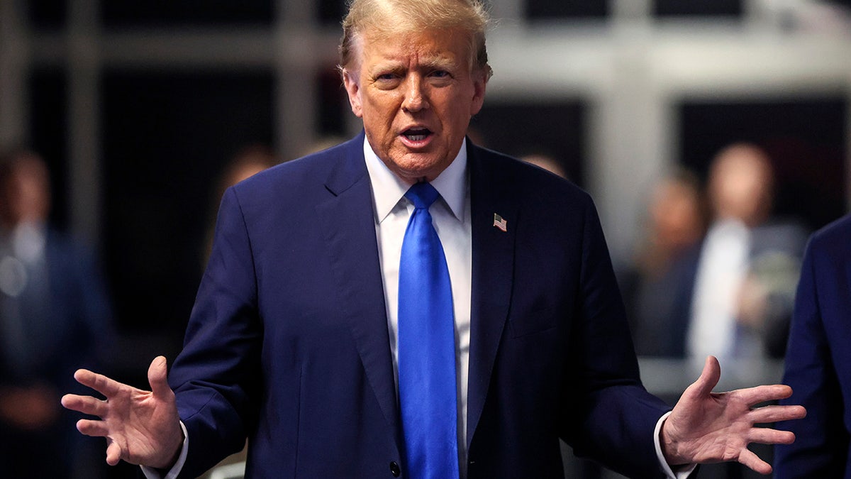 Donald Trump in navy blazer and blue tie