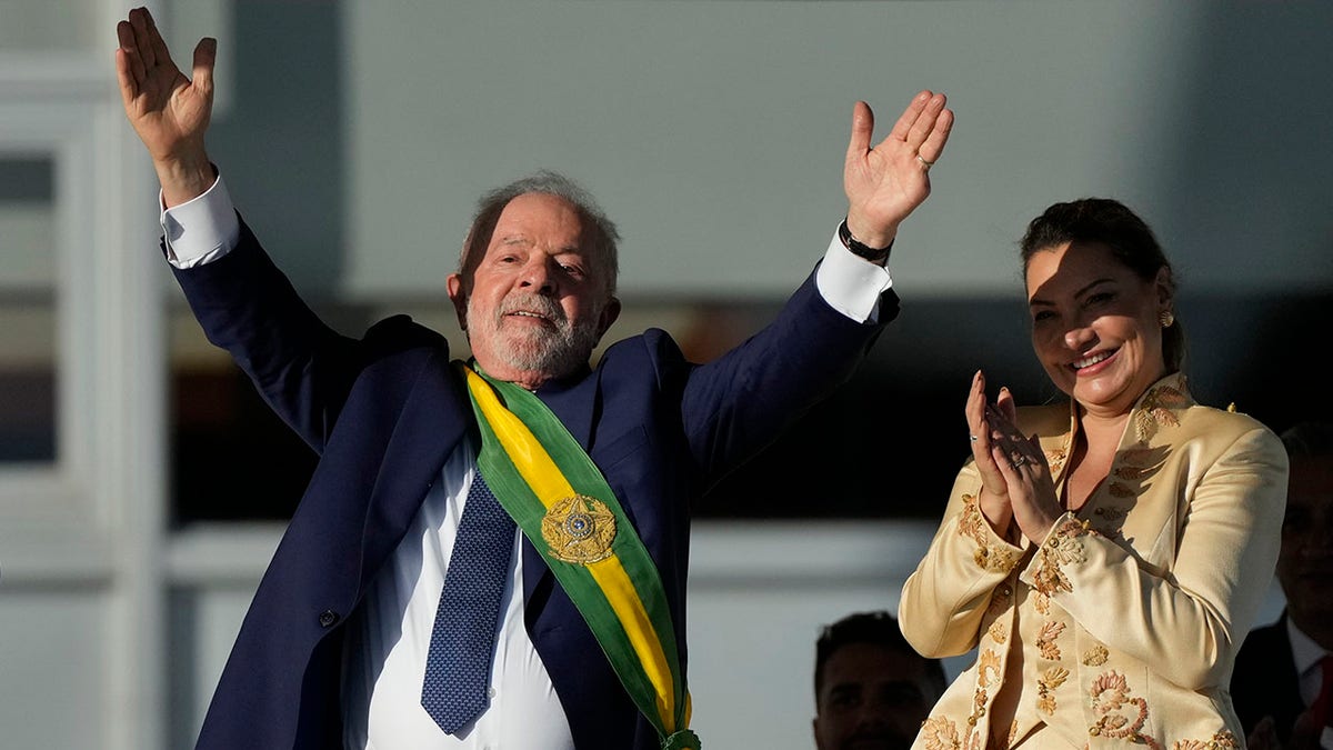 Brazil President Luiz Inacio Lula da Silva waves at inauguration
