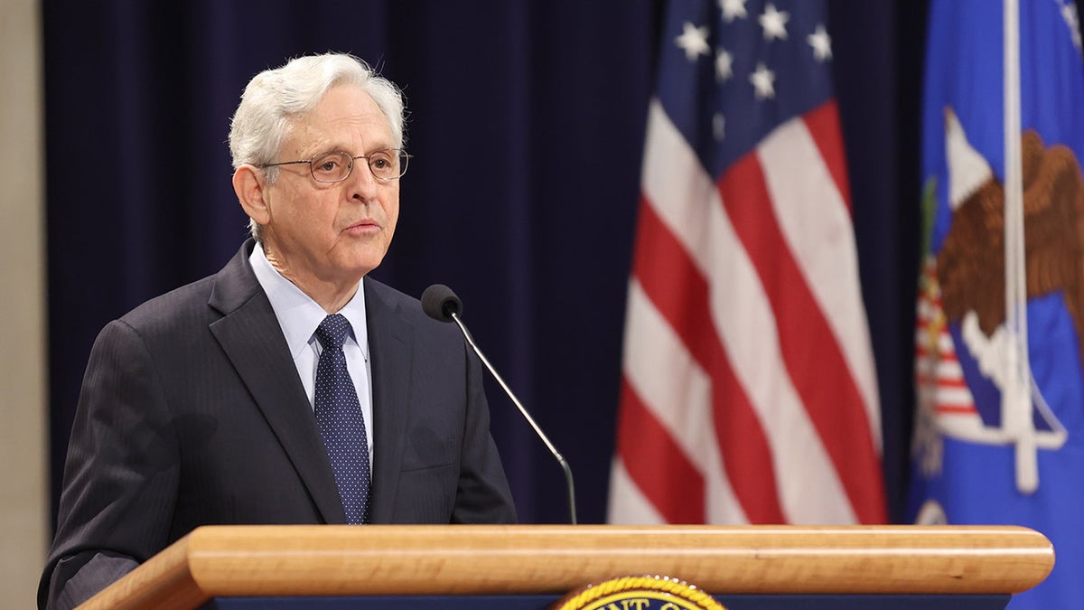 Garland at a podium