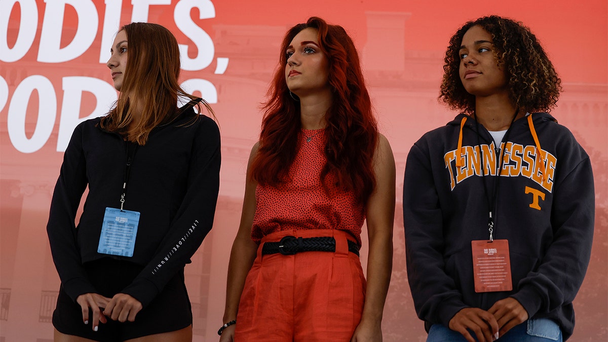 Former Connecticut high school athletes listen during