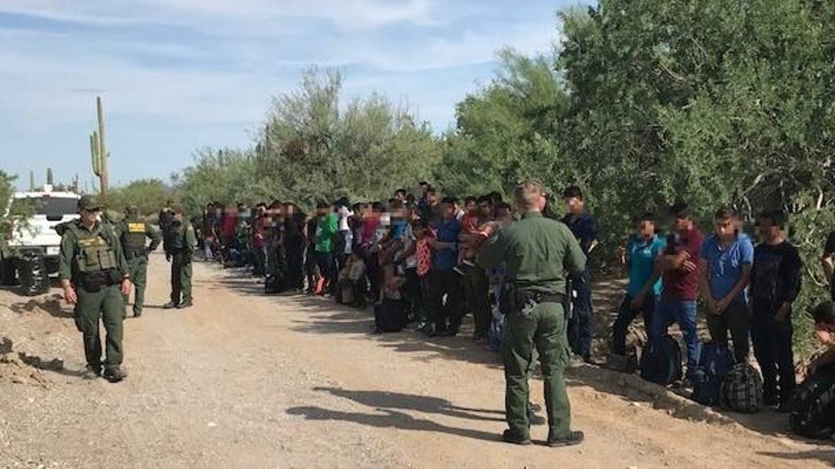 migrants detained by Border Patrol on road in Arizona