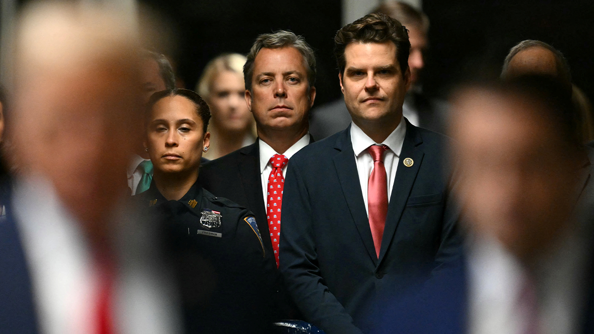 Rep. Gaetz with others in court