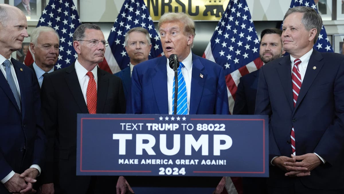 Former President Donald Trump, the presumptive GOP nominee, speaks with reporters at the NRSC on June 13, 2024, in Washington, D.C.