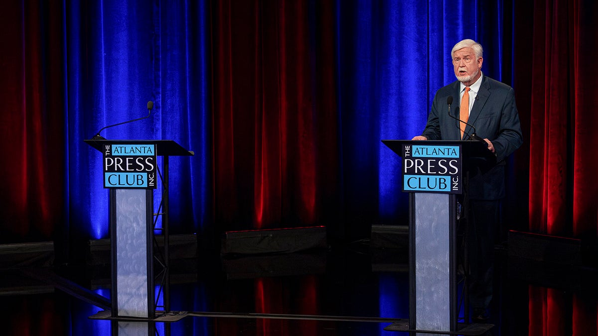 Johnson alone on debate stage