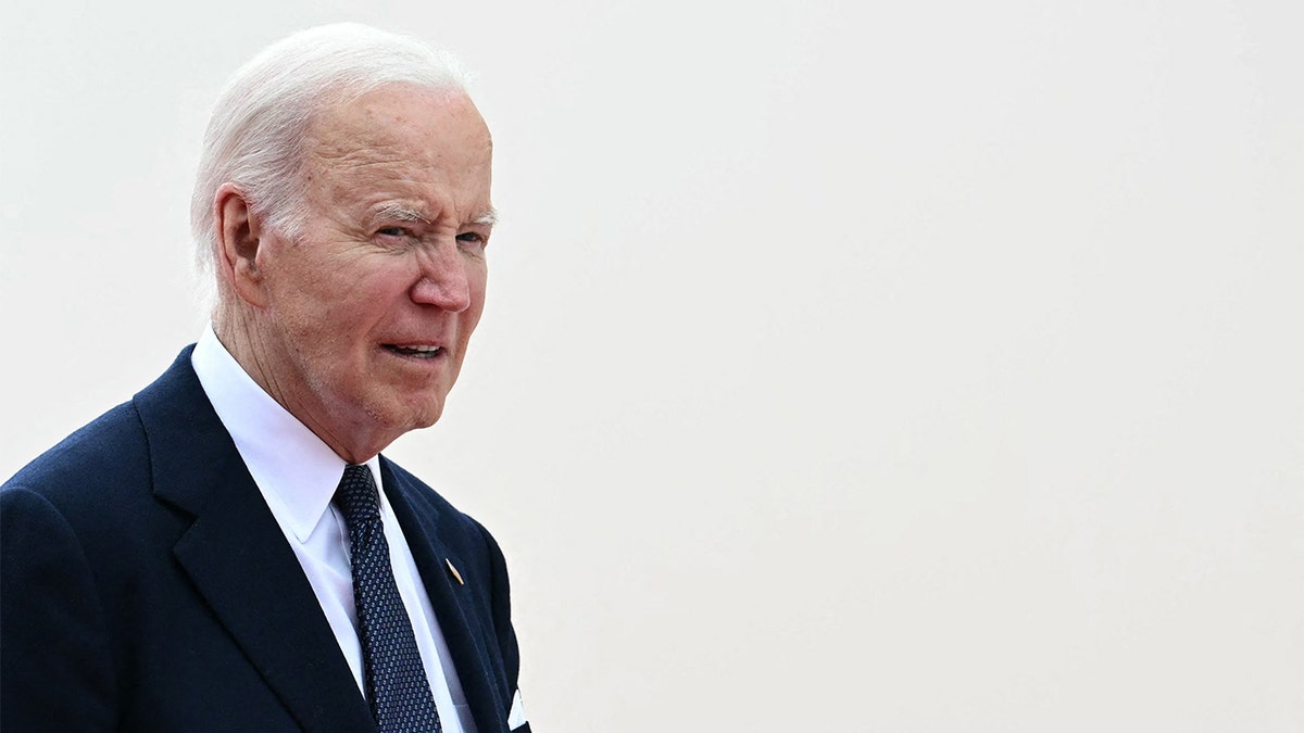 Biden arriving in France.