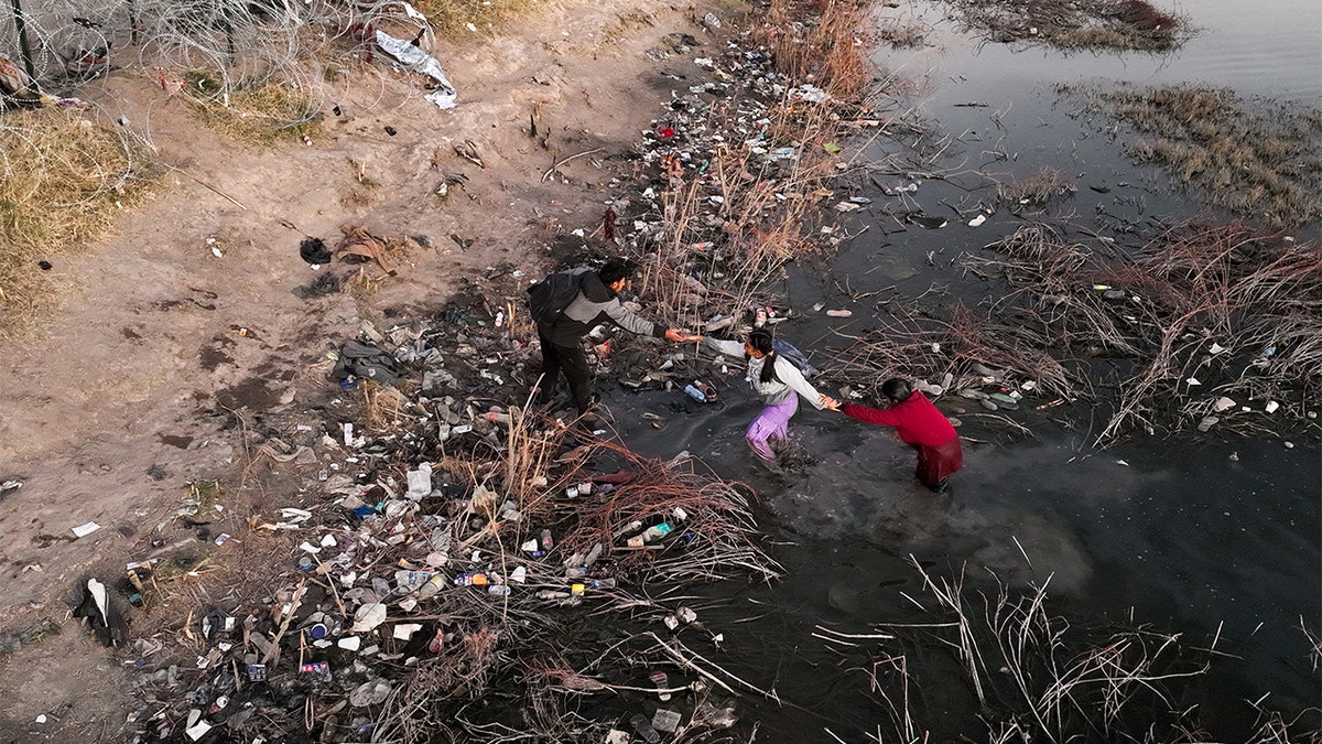 Migrants crossing the border into Texas