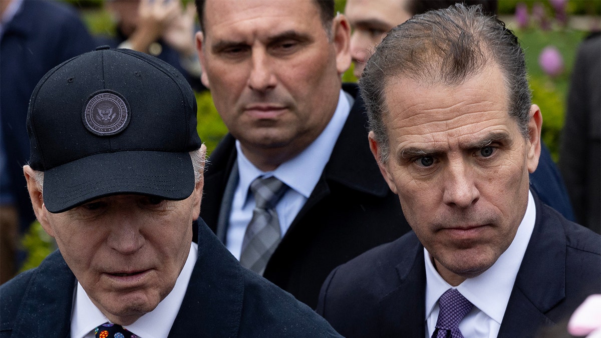 President Biden in dark baseball cap with son Hunter Biden