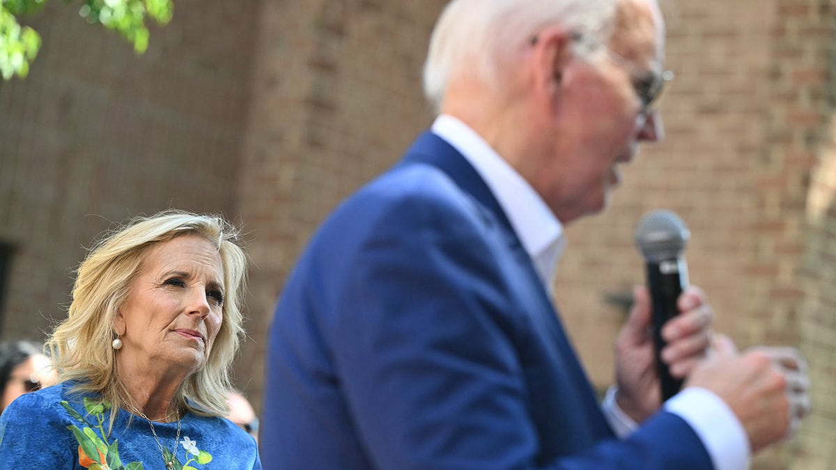 Joe Biden speaks while First Lady Jill looks on