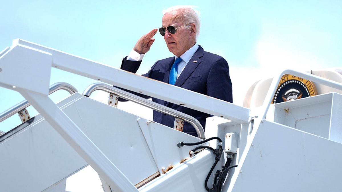 President Joe Biden boards Air Force One at Dover Air Force Base