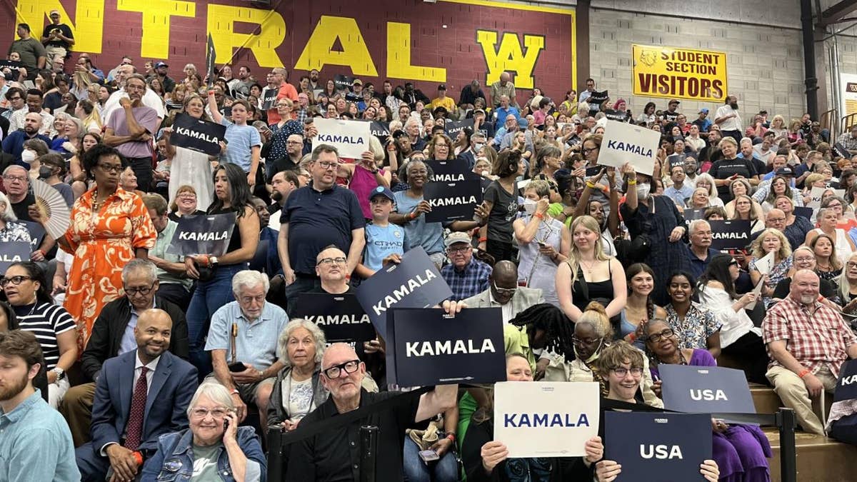 Kamala Harris rally attendees in bleachers