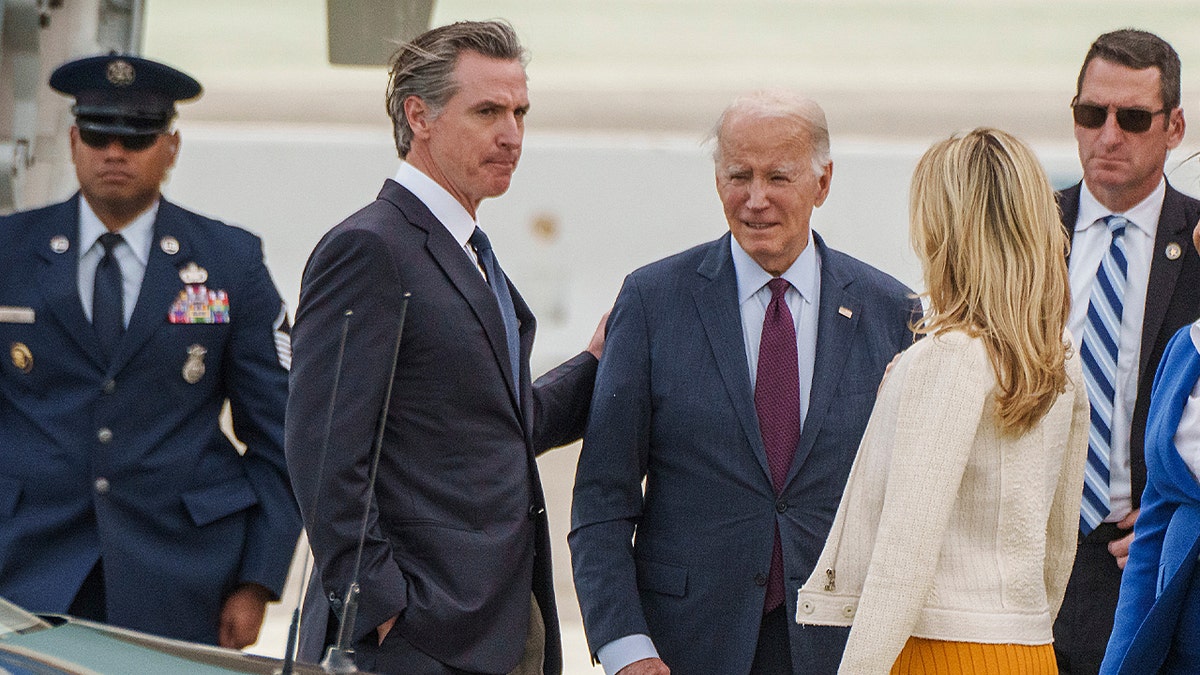 Gov. Newsom, left, with President Biden