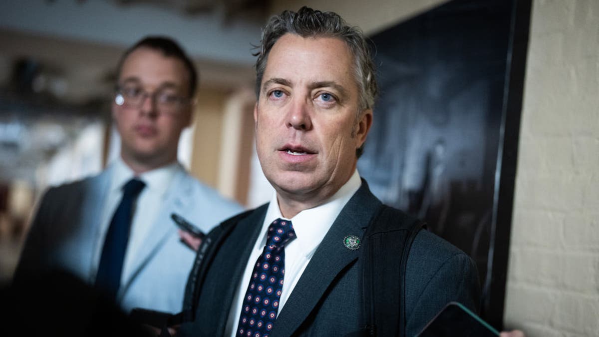 Rep. Andy Ogles wearing a suit and tie