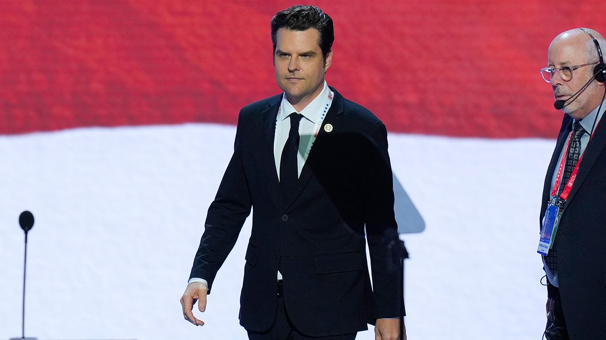 Rep. Matt Gaetz walking towards the podium during the walkthrough for the Republican National Convention