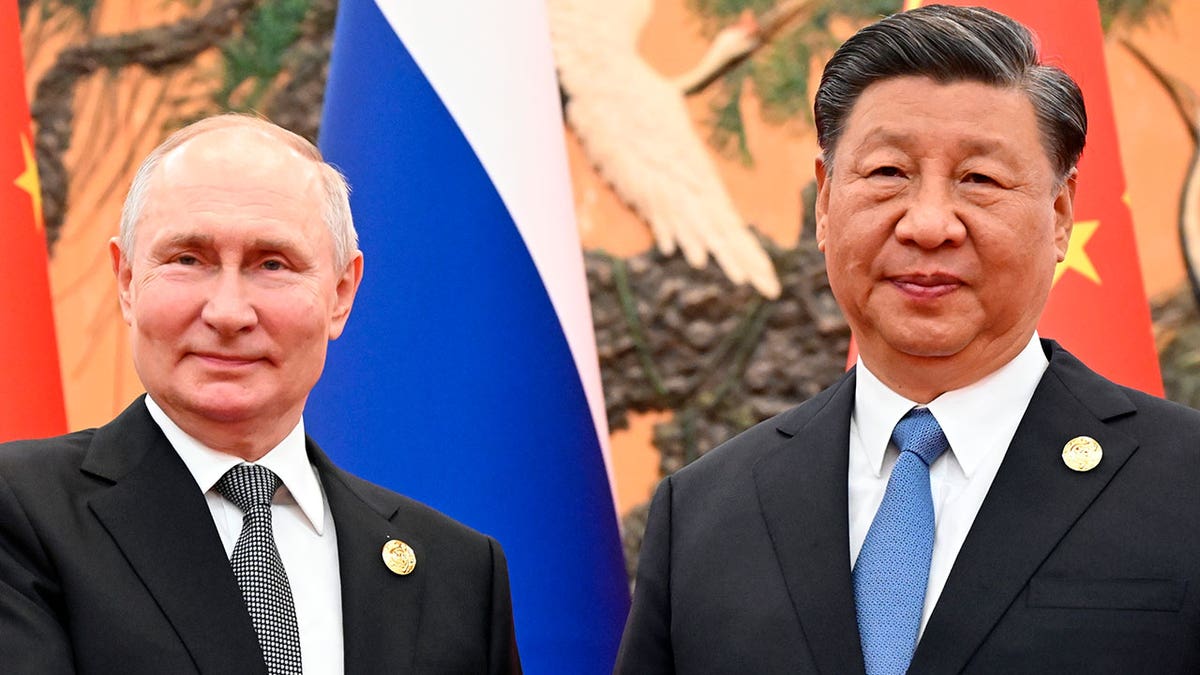 Chinese President Xi Jinping, right, and Russian President Vladimir Putin