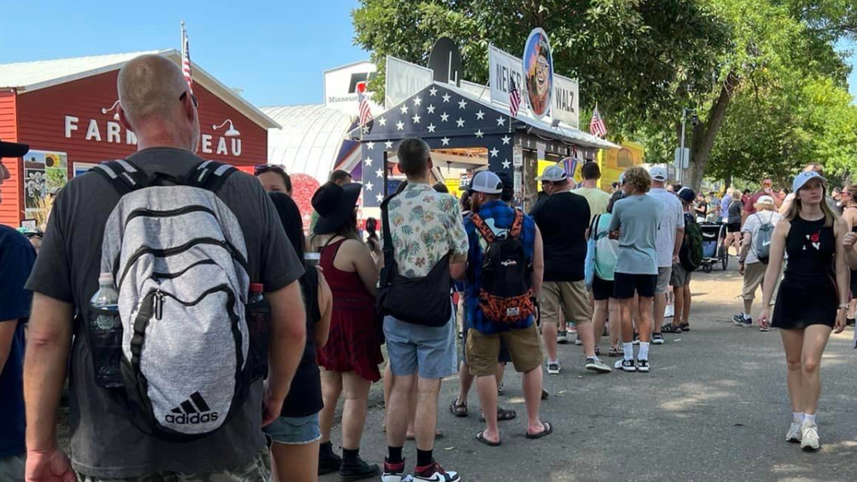 Crowd waiting for 'Never Walz' booth at Minnesota state fair