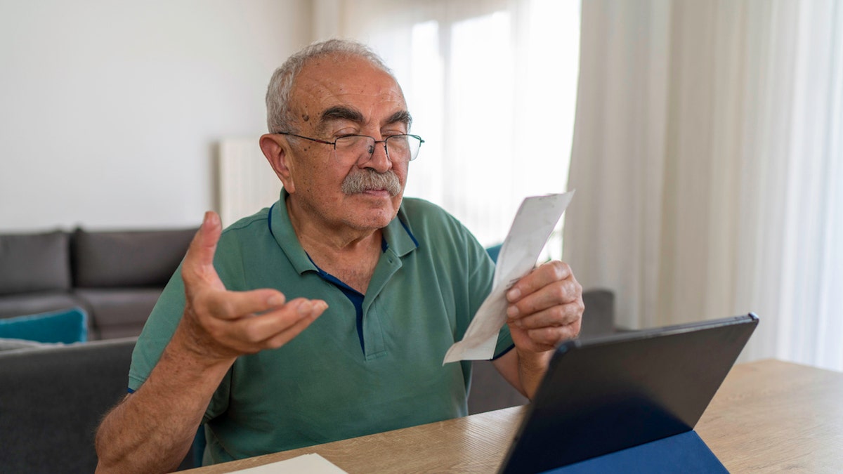 Man with medical bill