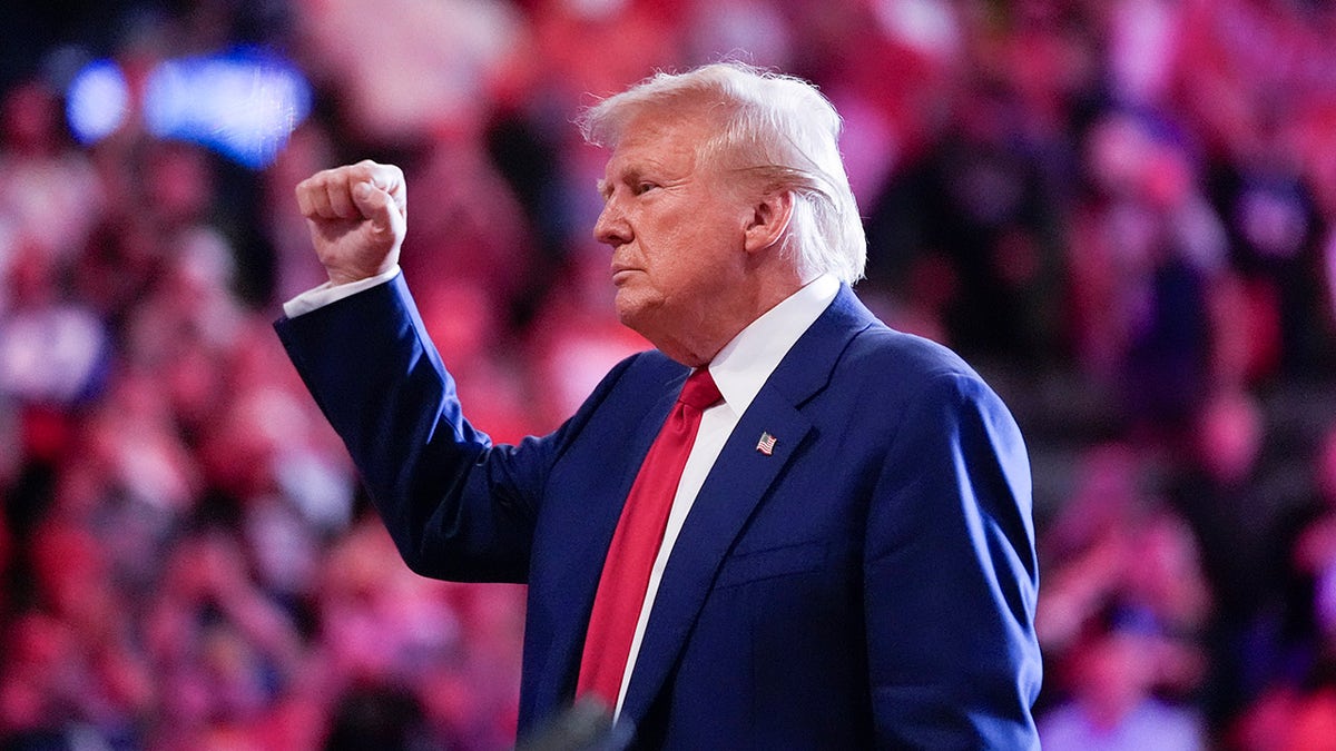 Trump pumps fist at Uniondale, NY rally