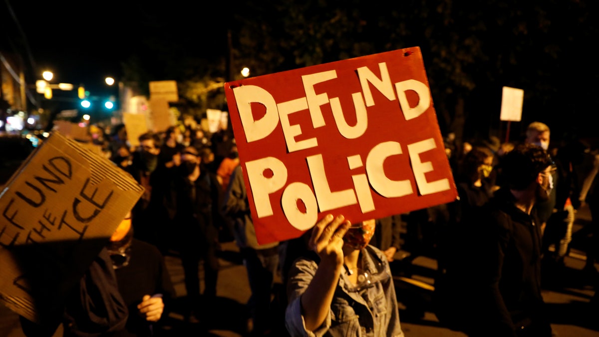 nighttime "defund police" protest in Sept. 2020