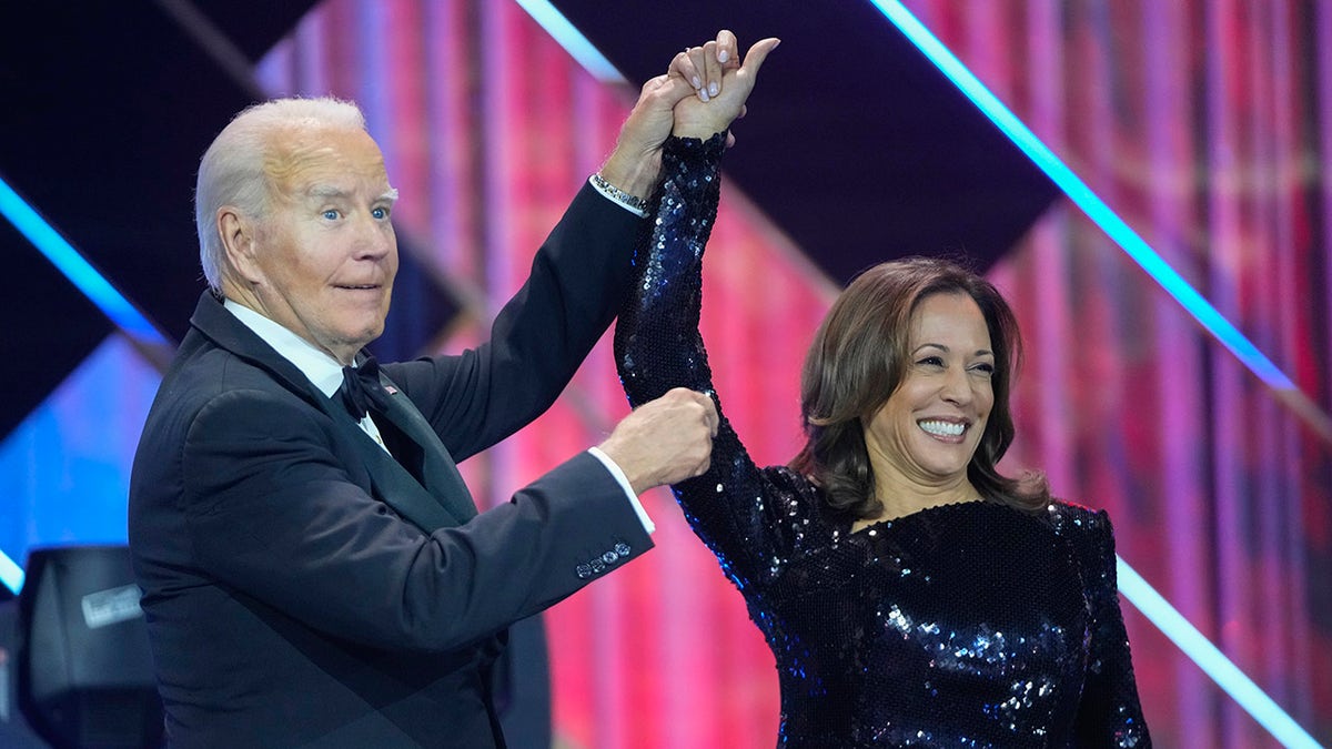 Biden raises Harris' hand