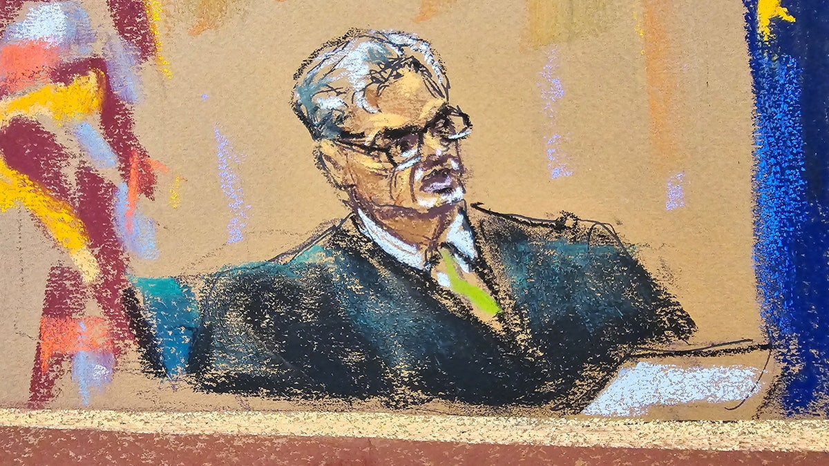 Justice Juan Merchan looks on as Donald Trump attends his criminal trial