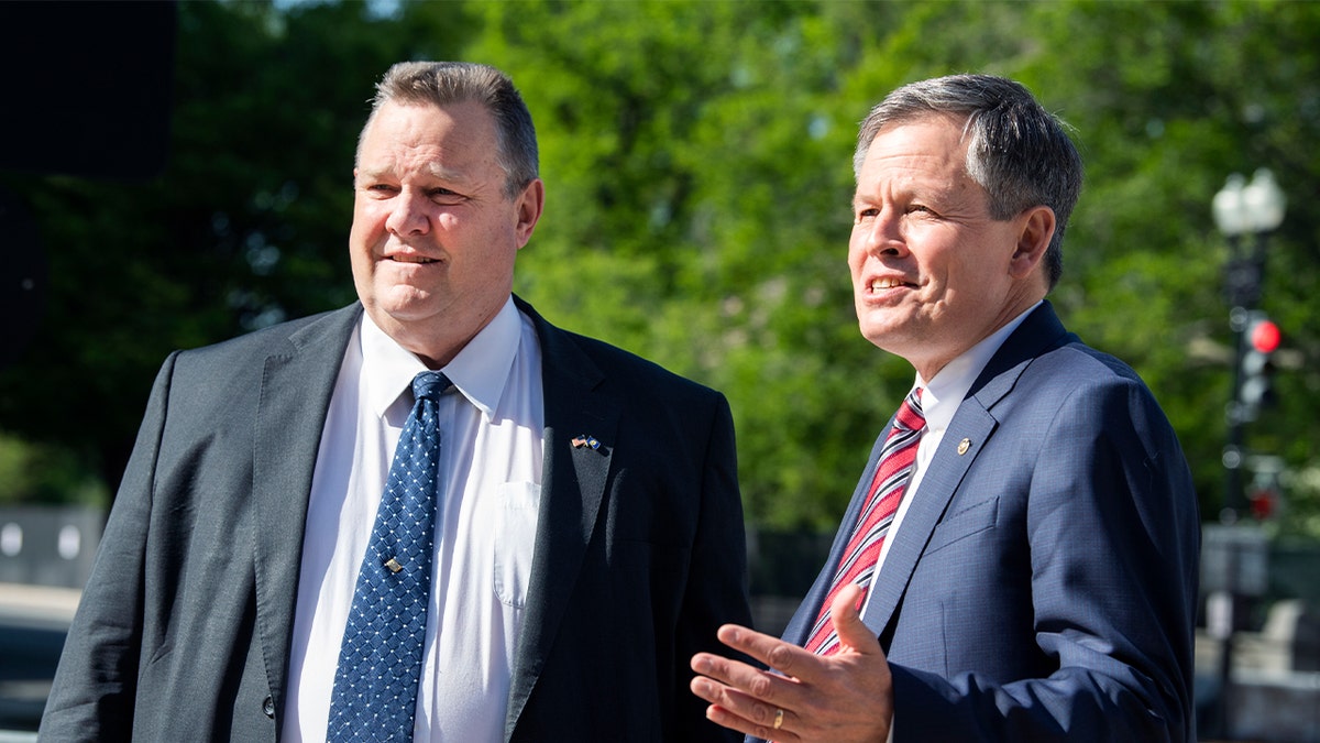 Senators Jon Tester, D-Mont., left, and Steve Daines, R-Mont., film a message outside Dirksen Building on the importance of getting a COVID-19 vaccine April 27, 2021.