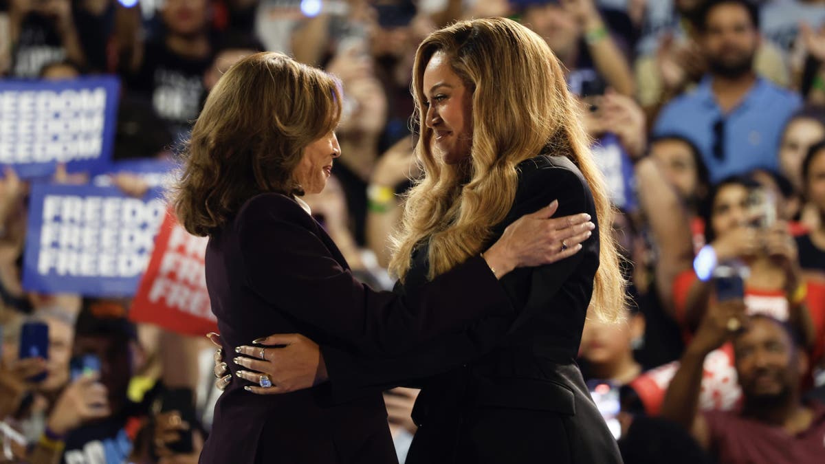 Beyonce and Kamala Harris embrace on stage