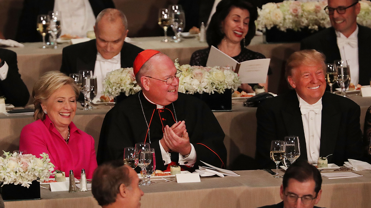 Cardinal Dolan between Hillary Clinton and Donald Trump at 2016 Al Smith dinner