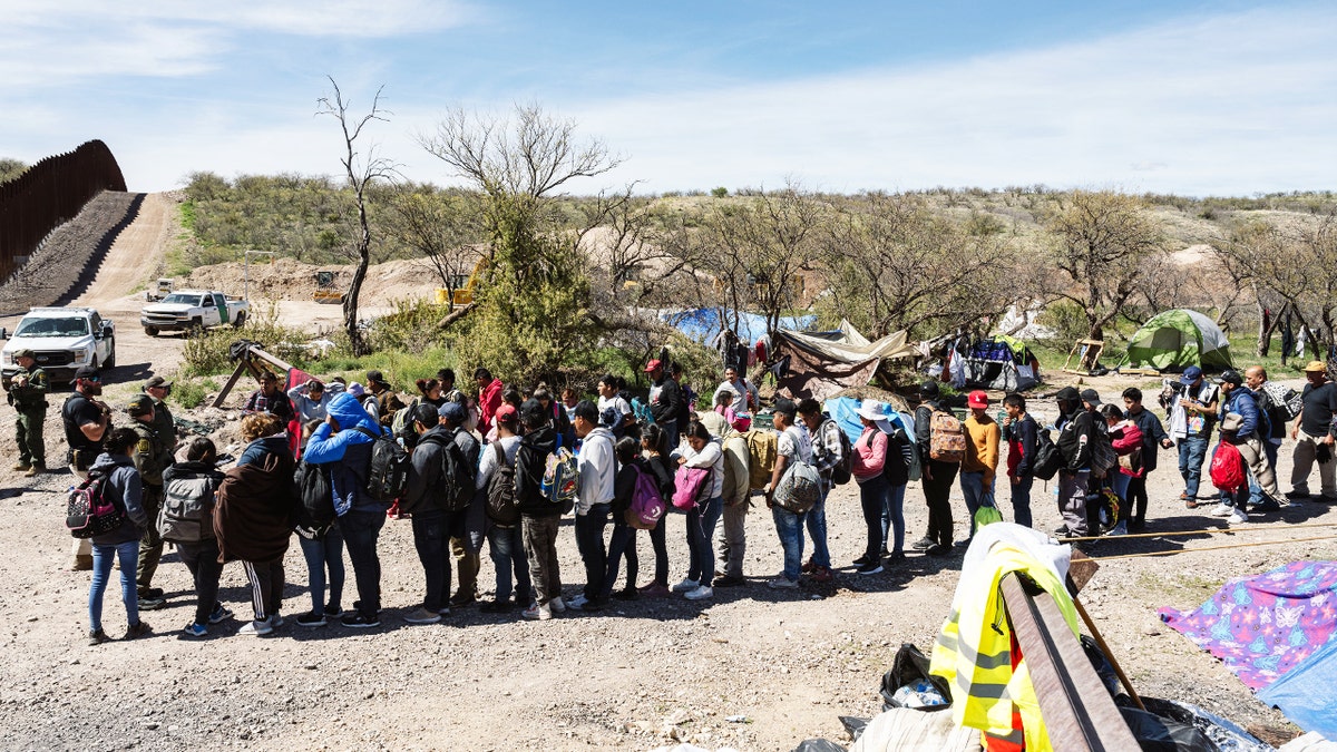 Border Patrol picks up a group of asylum seekers from an aid camp at the US-Mexico border near Sasabe, Ariz. on Wednesday, March 13, 2024. 