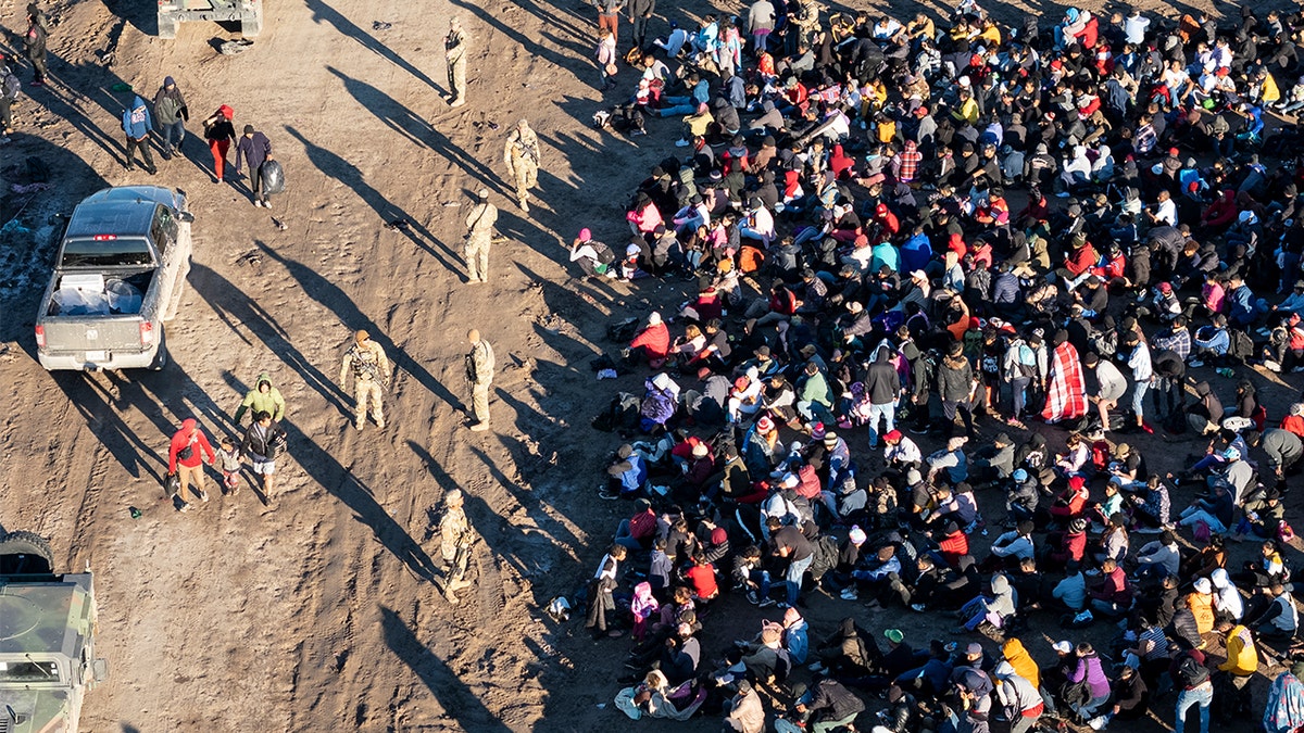 migrants massed at Eagle Pass border crossing seen from above