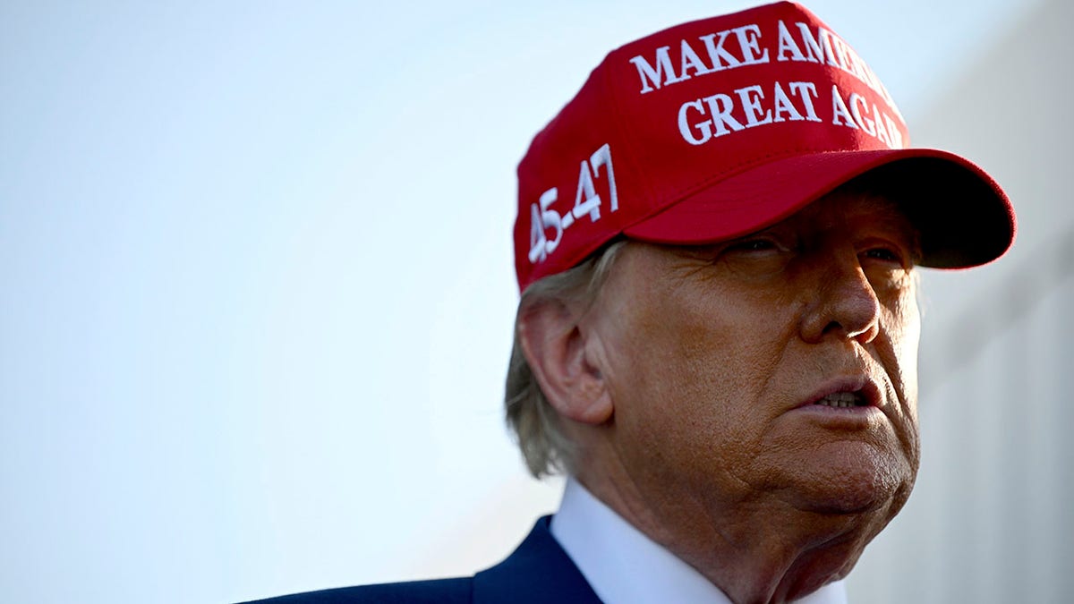 Donald Trump wearing a MAGA hat at Starship launch