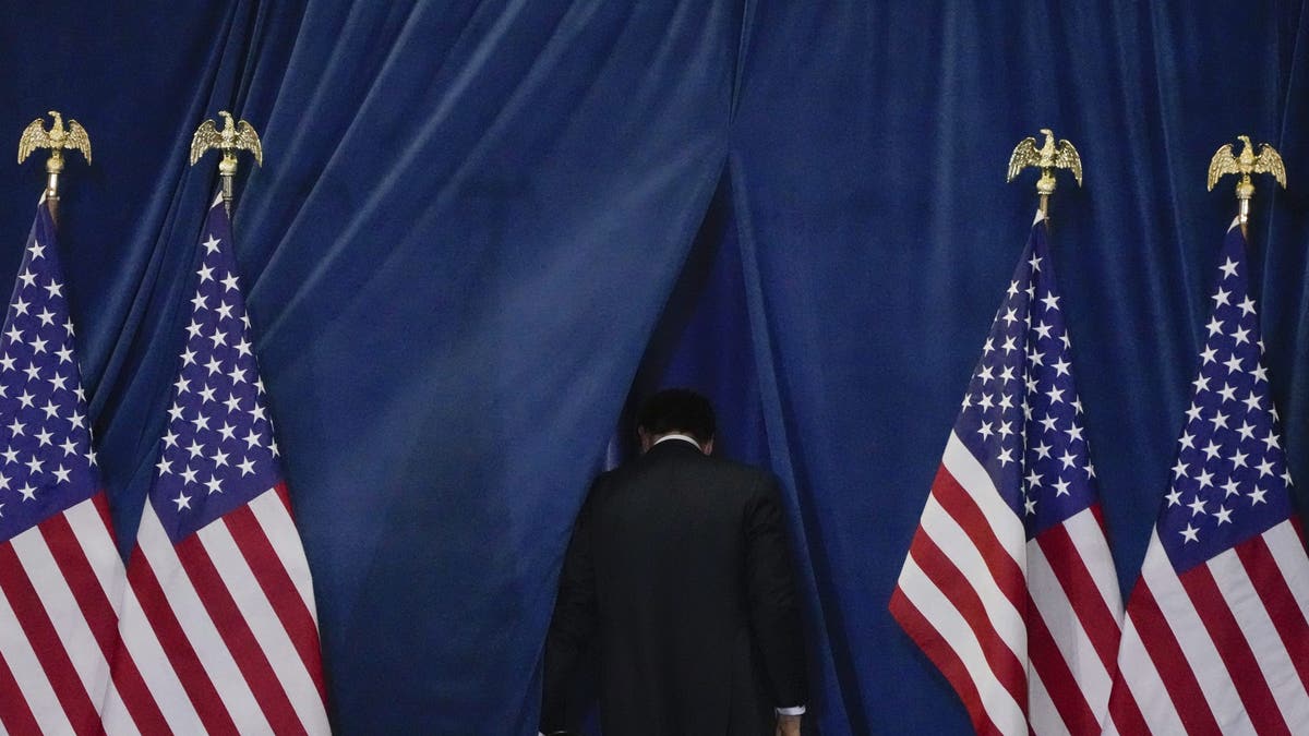 Republican vice presidential nominee Sen. JD Vance, R-Ohio, leaves the stage after speaking during a campaign rally on Monday, Nov. 4, 2024, in Newtown, Pa. 