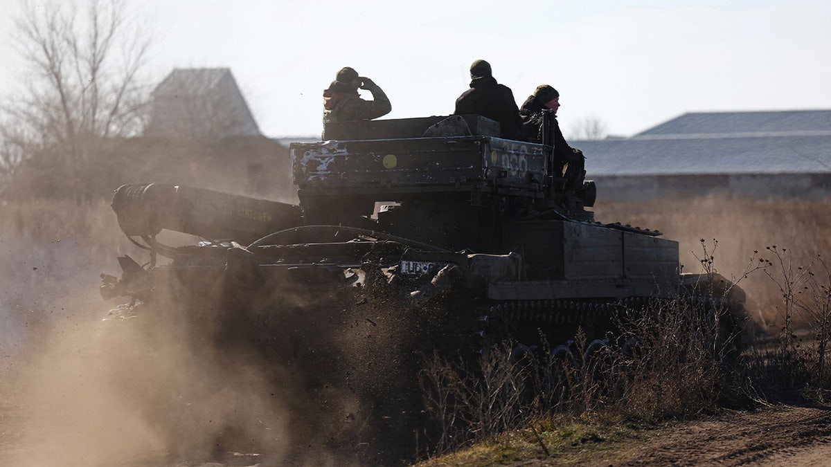 Ukrainian servicemen in a vehicle