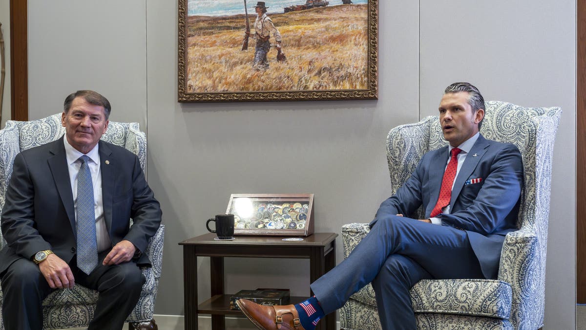 Sen. Mike Rounds, R-S.D., a member of the Senate Armed Services Committee, left, meets with Pete Hegseth, President-elect Donald Trump's nominee to be defense secretary, at the Capitol in Washington, Thursday, Dec. 5, 2024. (AP Photo/J. Scott Applewhite)