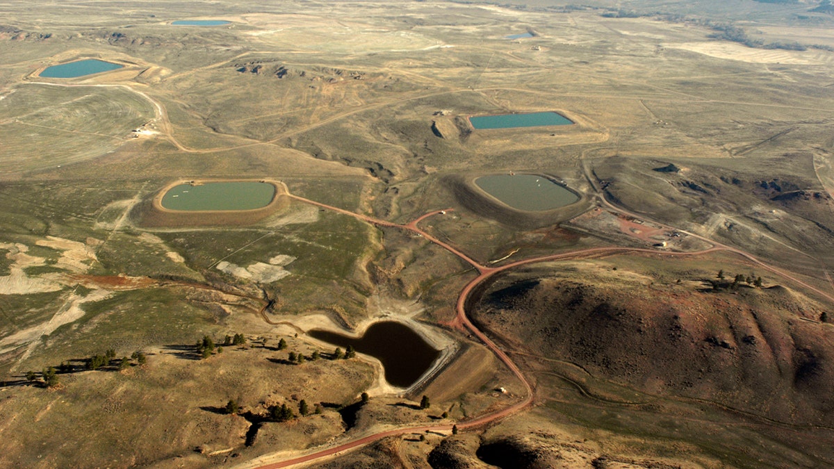 Aerial photo of water holding ponds on private and public lands in the Tongue River and Powder River area of northern Wyoming near the Montana border. 