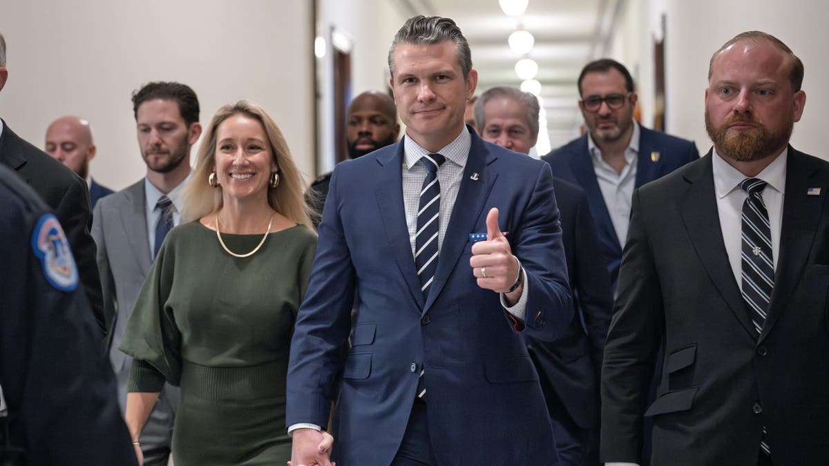 Hegseth with his wife